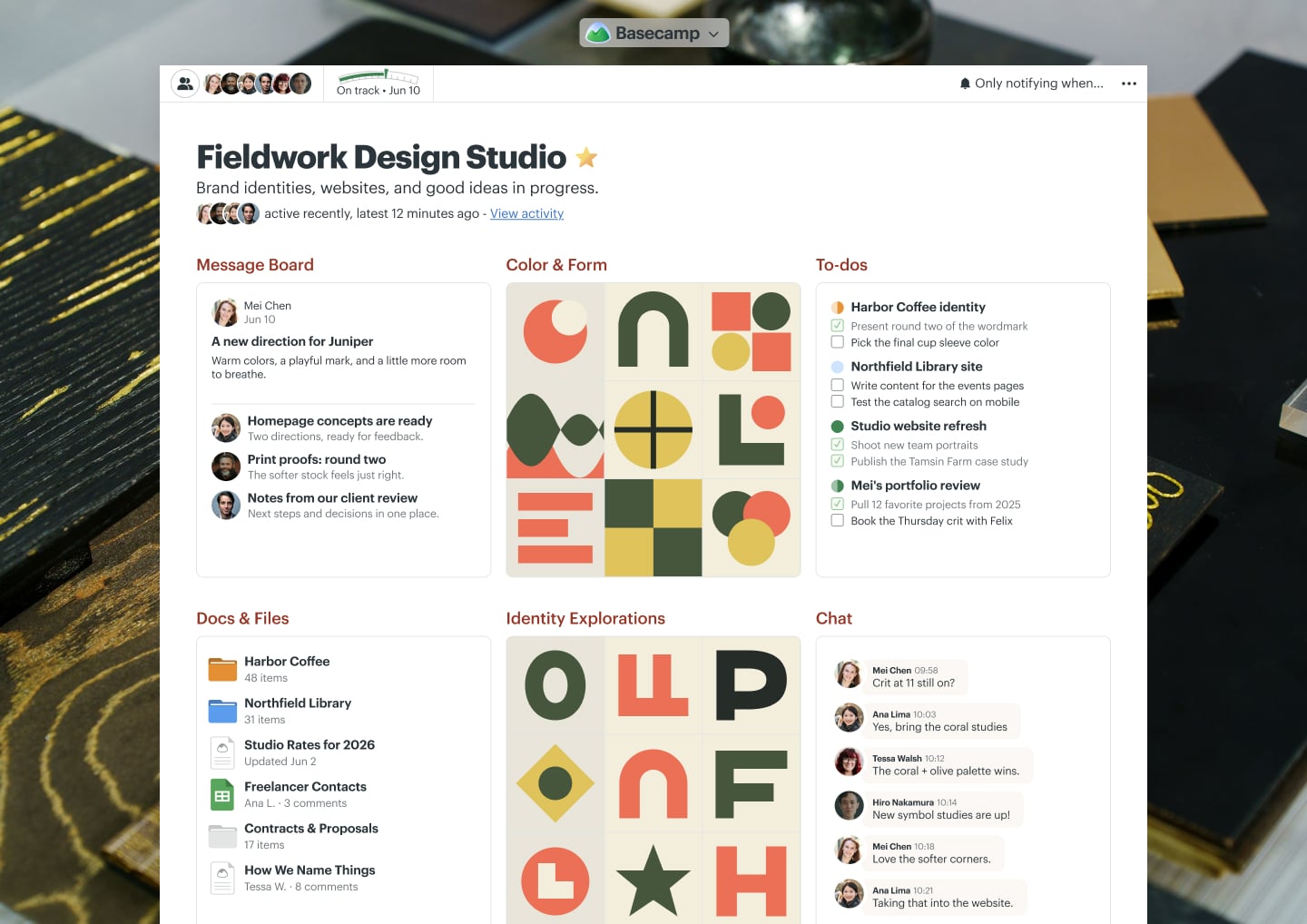 A design agency client work project in Basecamp with Docs & Files, a Message Board, To-dos, a Calendar, and Chat