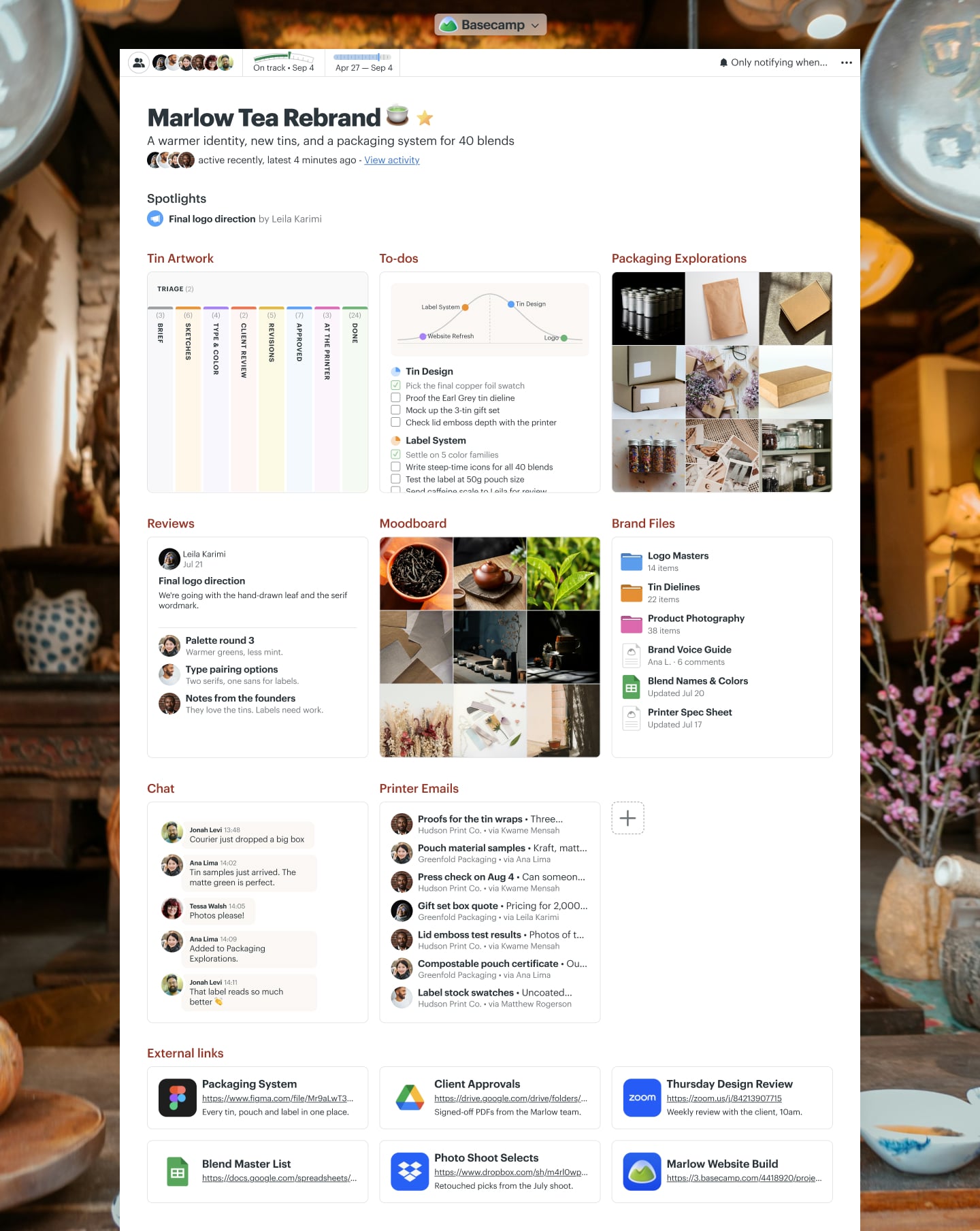 A brand identity refresh project in Basecamp with a Message Board, a Card Table, Docs & Files, and Email Forwards